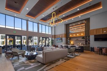 Elegant clubroom with tv and workspace